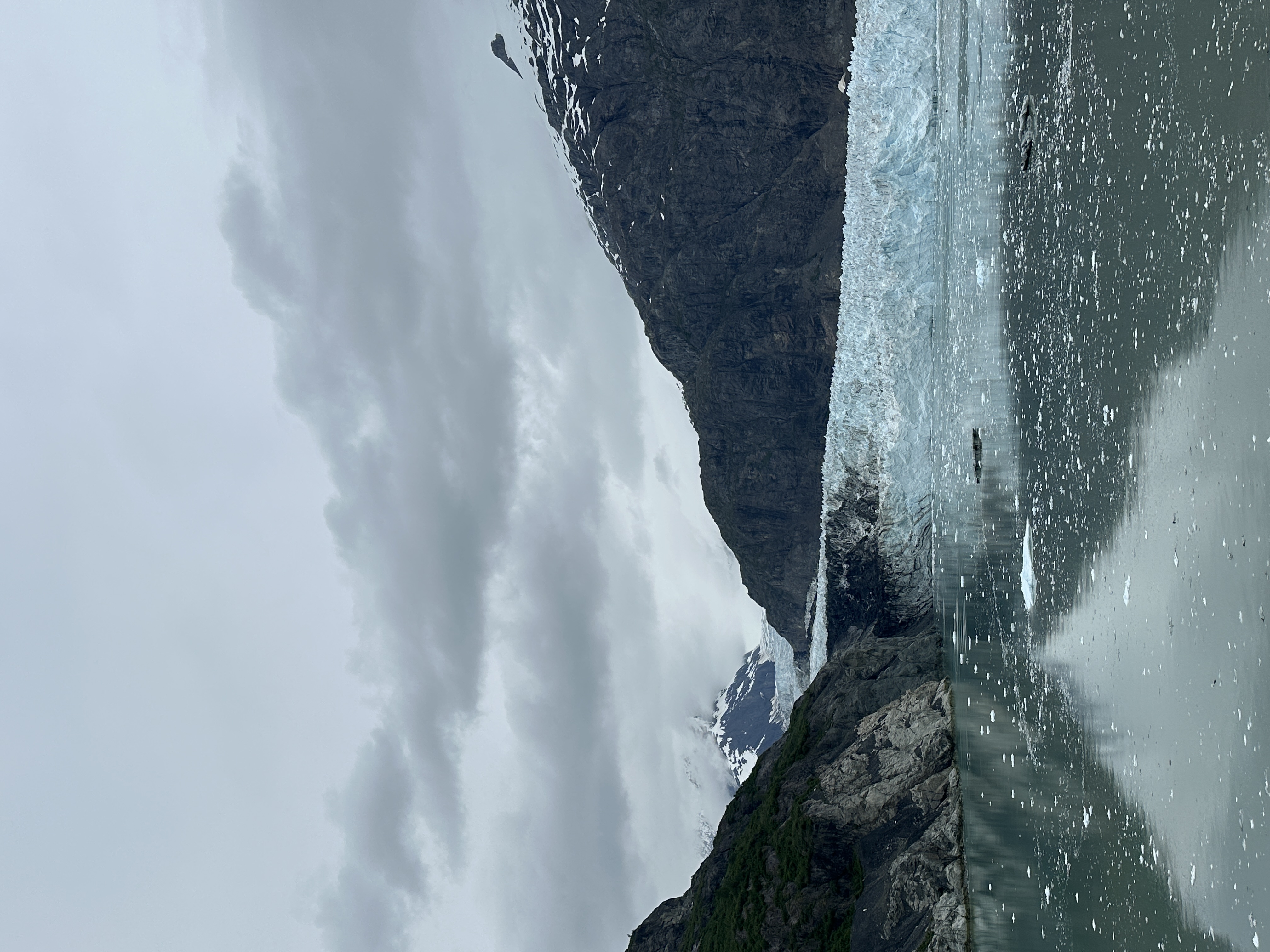 A tidewater glacier meeting the sea in Glacier Bay, Alaska